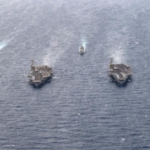 US-Iran Tensions: पश्चिम एशिया में तनाव के बीच ईरान का बड़ा एलान, अमेरिकी युद्धपोत के पास करेगा नौसैनिक अभ्यास