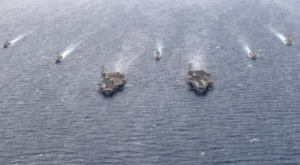 US-Iran Tensions: पश्चिम एशिया में तनाव के बीच ईरान का बड़ा एलान, अमेरिकी युद्धपोत के पास करेगा नौसैनिक अभ्यास